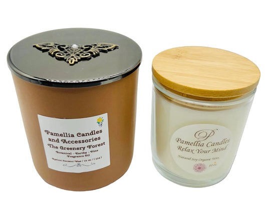 Two candles with decorative lids on a white background, one in brown with a silver lid and the other in glass with a wooden lid.